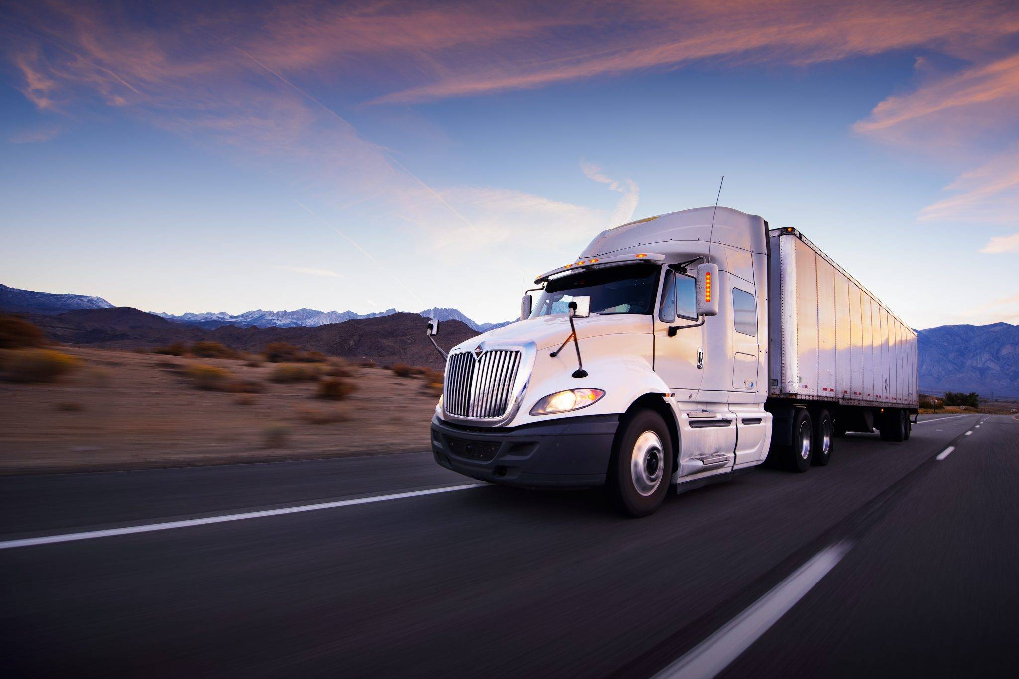Truck And Highway At Sunset Transportation Background
